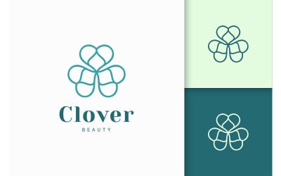 Logotipo de hoja de trébol en forma de línea y amor