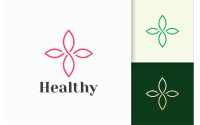 Bloemlogo in vrouwelijk en luxe voor gezondheid en cosmetica