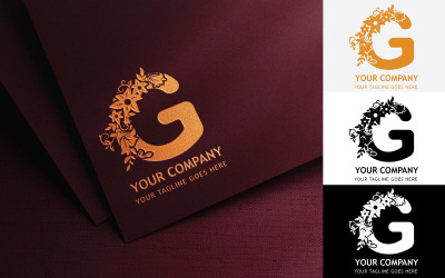 Design de logotipo bordado com letra G floral - identidade da marca