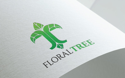 Modello minimo di logo dell&amp;#39;albero floreale della lettera T