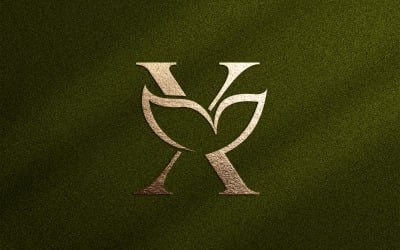 Blumenschönheits-Logo-Blatt-natürlicher Buchstabe X