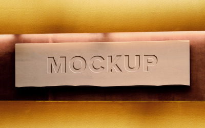 Debossed effect logo mockup on brown wood texture