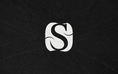 Logo-Attrappe auf schwarzem Texturhintergrund