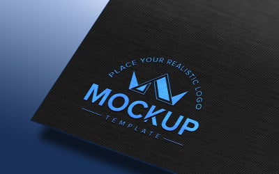 Embossed glossy blue logo mockup on blue black craft paper texture