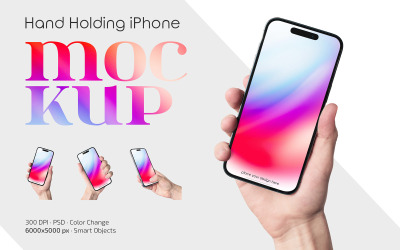 Ręka trzyma zestaw makiet iPhone&amp;#39;a