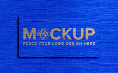 Maquete do logotipo na textura de fundo de tecido azul