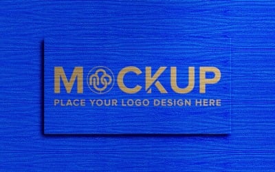 Maquette de logo sur la texture de fond de tissu bleu