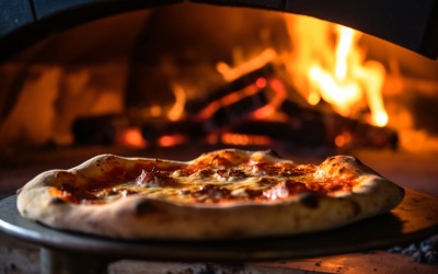 Pizzas on a pizza stone in front of a fire 39
