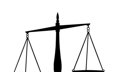 Black silhouette of the scales of justice isolated on a white background for legal concepts.