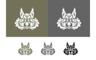 Emblema con cabeza de lince, adornado con intrincados diseños y colores en espiral.