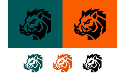 Fierce wild boar head logo design in geometric style.