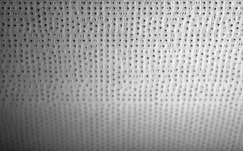 Textured dot wall background_surface dot background_dot leather background Background