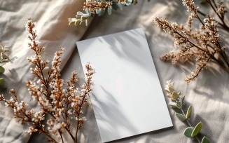 White Paper Card On Dried Flowers Design Mockup 117