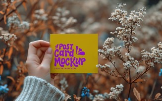 Paper Held Against Dried Flowers Card Mockup 35
