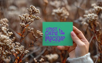 Paper Held Against Dried Flowers Card Mockup 37