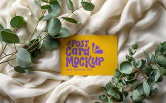 Paper Card Mockup With Plant branches on the silk cloth 64