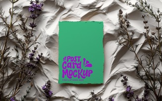 Post card Mockup with dried Flowers on The rustic tile 129
