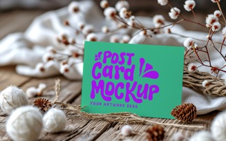 Post card Mockup With Pine Cone On the cloth 213