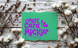 Post card Mockup with dried Flowers on The wooden table 235