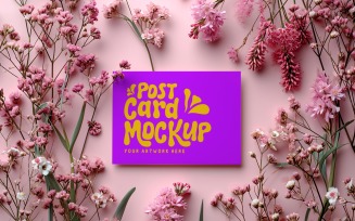 Post card mockup with flowers on the Pink Background 308