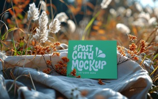 Post card mockup with dried flowers on the silk cloth 343