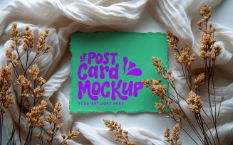 Post card mockup with flowers on the cloth 356