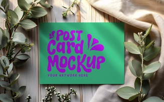 Post card mockup with flowers on the cloth 389