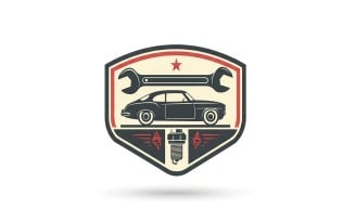 Retro automotive service emblem featuring a classic car wrench and spark plug design