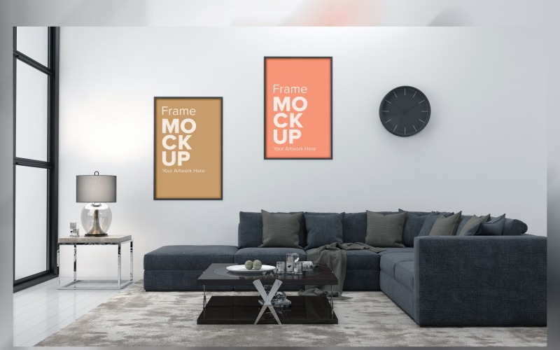 Moderní obývací pokoj, pohovka s polštáři a maketa se dvěma rámečky