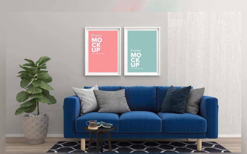 Sofá azul com almofadas em uma sala de estar com uma maquete de duas molduras, planta de casa