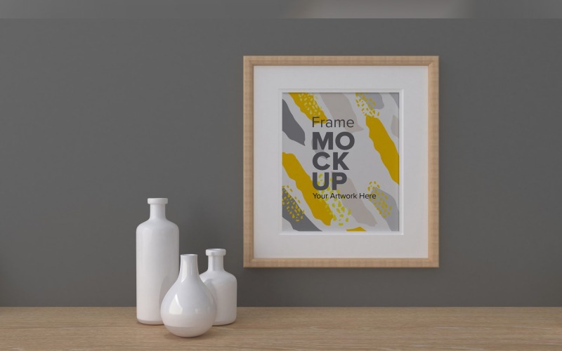 Cornice accanto a vasi su un modello di mockup di parete grigia
