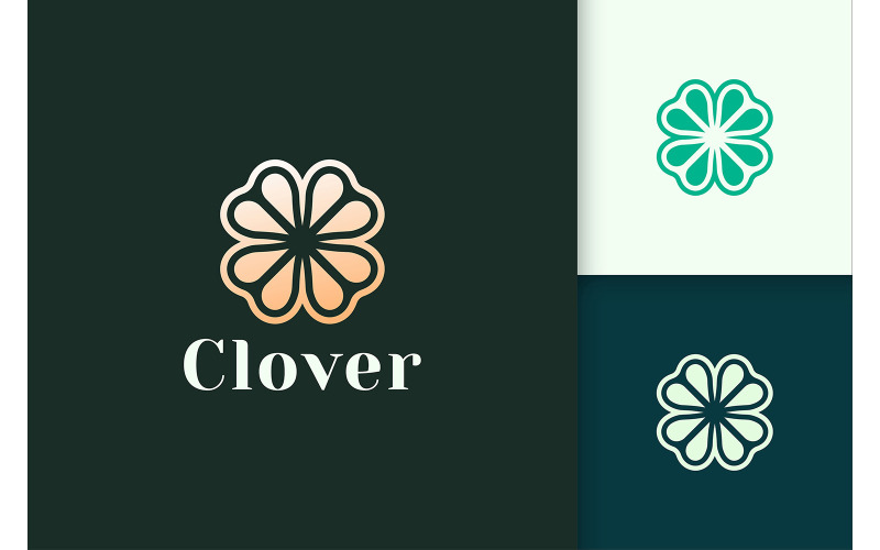 Clover Leaf-logotyp i lyxig guldfärg