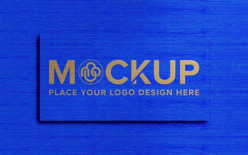 Maquete do logotipo na textura de fundo de tecido azul