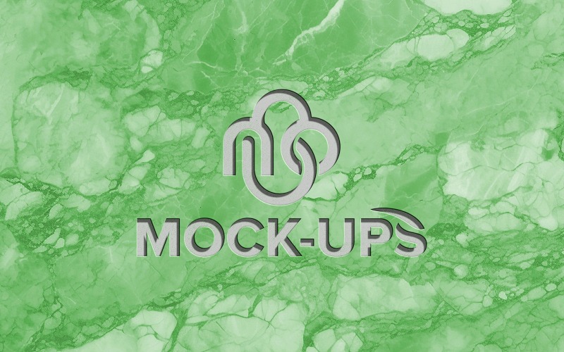 Parede de mármore verde com maquete de logotipo em relevo